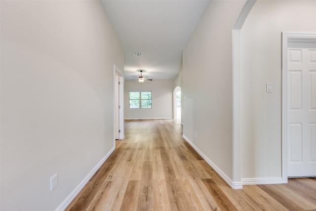 corridor featuring light wood-type flooring