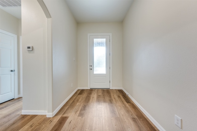 doorway featuring light hardwood / wood-style flooring