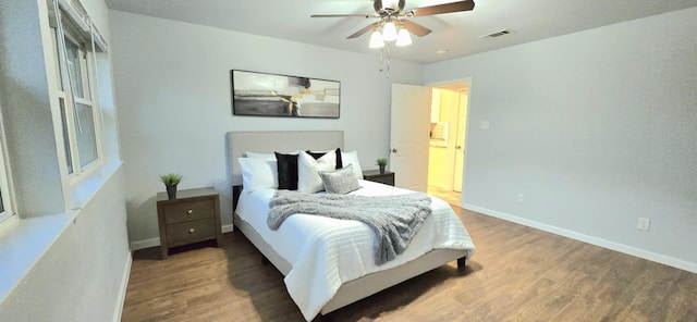 bedroom featuring hardwood / wood-style floors and ceiling fan