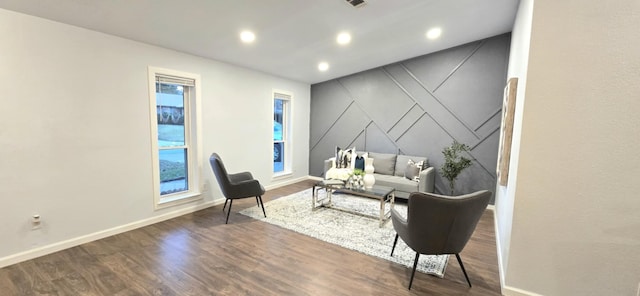 living room featuring dark hardwood / wood-style flooring