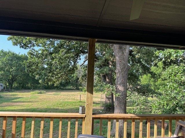 view of yard featuring a wooden deck