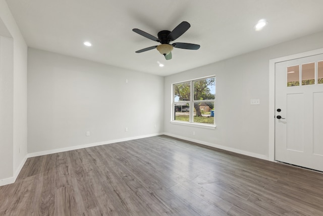 interior space featuring ceiling fan and wood-type flooring