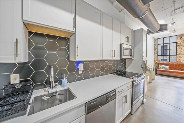 laundry room with separate washer and dryer