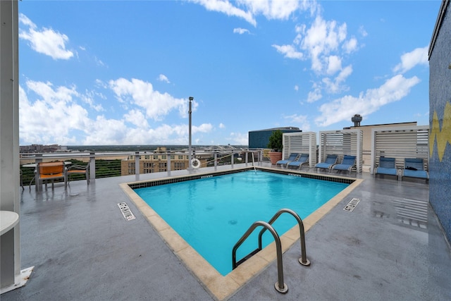 view of pool with a patio