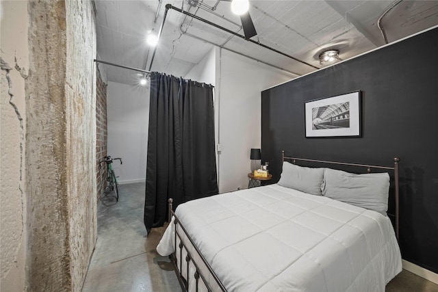 bedroom with concrete flooring