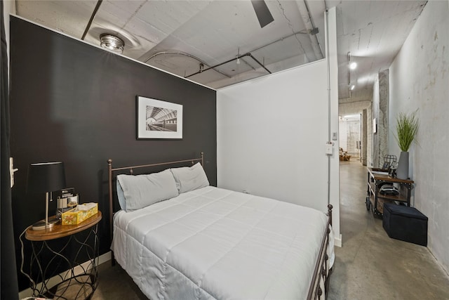 bedroom with concrete floors