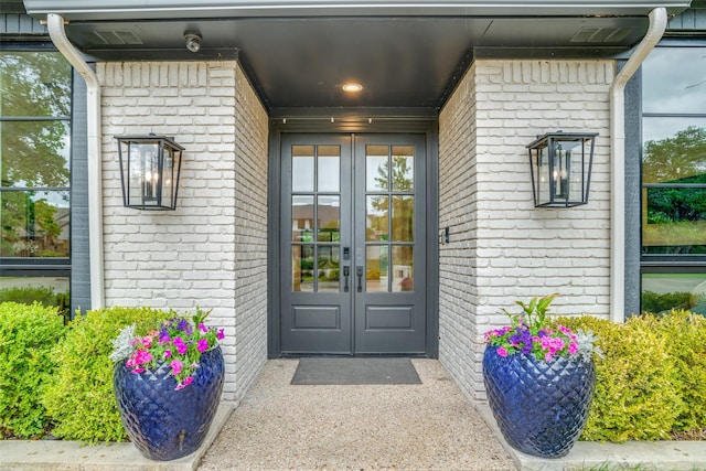 property entrance featuring french doors