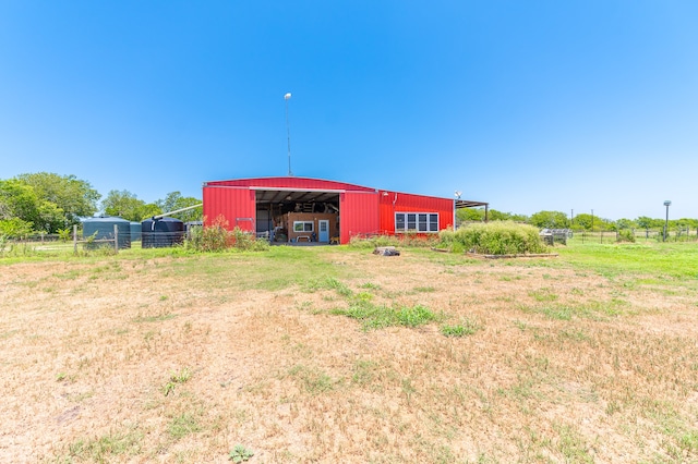 view of outdoor structure featuring a rural view