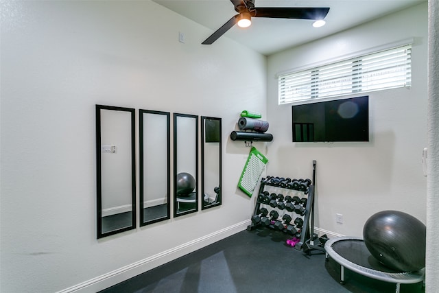 exercise room with ceiling fan