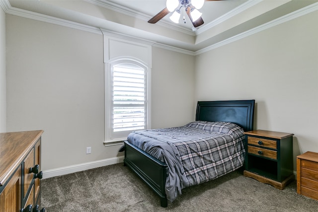 carpeted bedroom with crown molding and ceiling fan