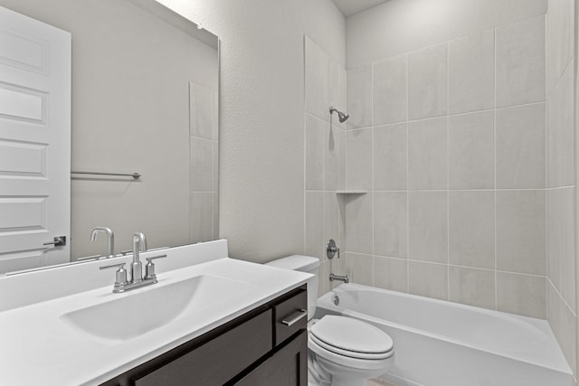 full bathroom featuring shower / tub combination, vanity, and toilet