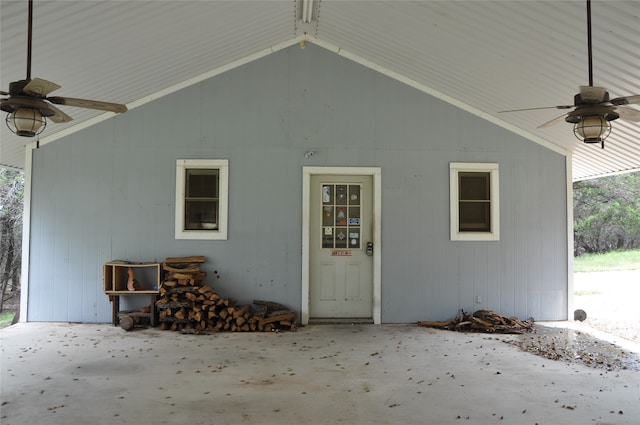 view of exterior entry with ceiling fan