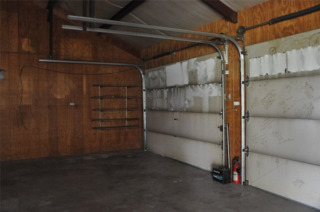 garage with wood walls