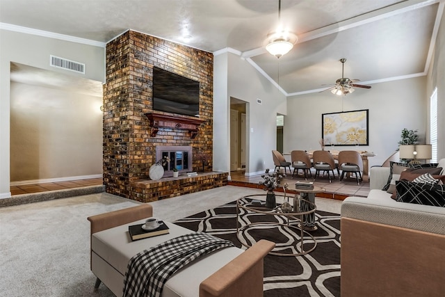 living room with a brick fireplace, ornamental molding, ceiling fan, high vaulted ceiling, and carpet floors