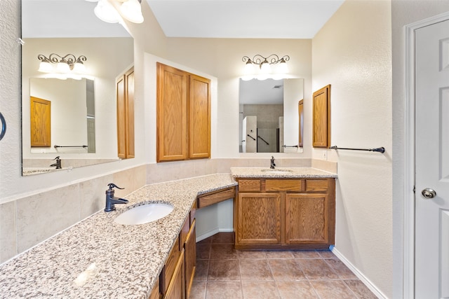 bathroom featuring tile patterned flooring, ceiling fan, a shower with door, and vanity