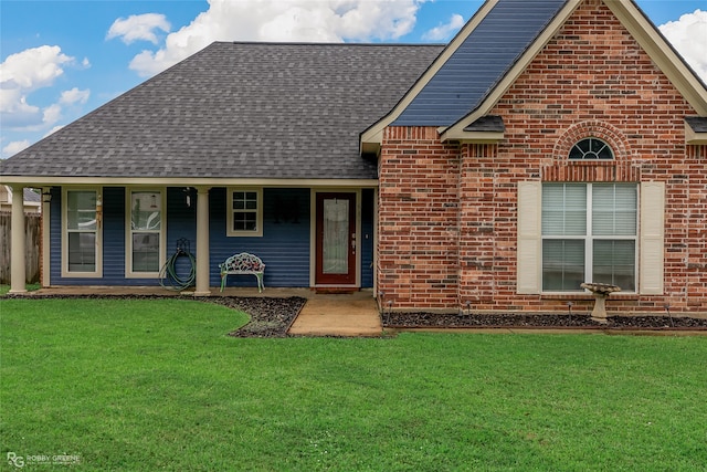 view of front of home with a front lawn