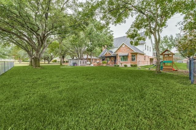 view of yard featuring a playground