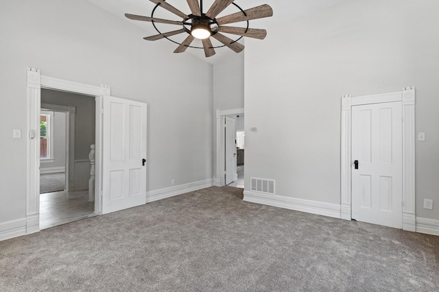 1401 Arp St, Commerce, TX 75428 - unfurnished bedroom featuring high vaulted ceiling, carpet floors, baseboards, and a ceiling fan