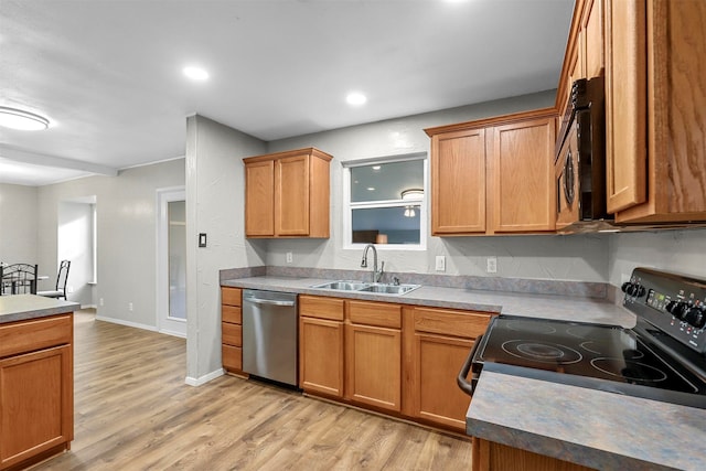 kitchen featuring light hardwood / wood-style flooring, range with electric cooktop, sink, and stainless steel dishwasher