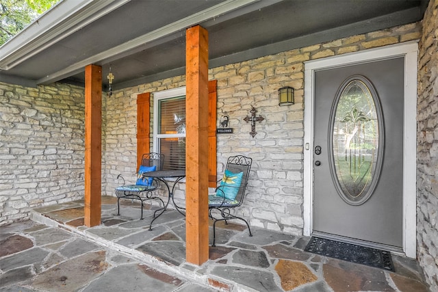 property entrance with a porch