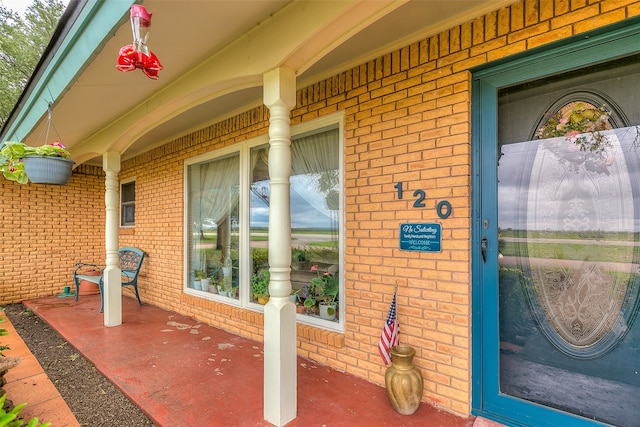 entrance to property with covered porch