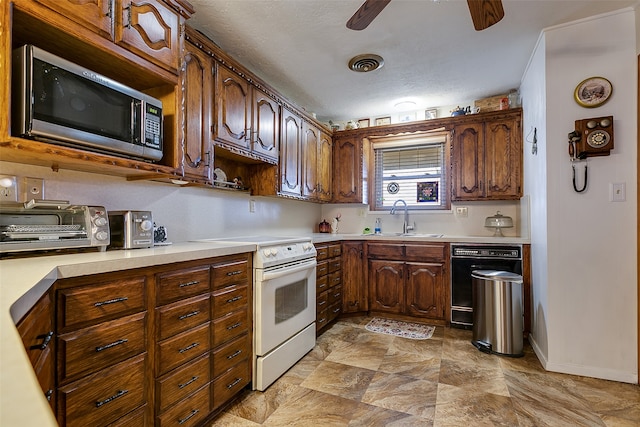 kitchen with a textured ceiling, dishwashing machine, electric range, sink, and ceiling fan