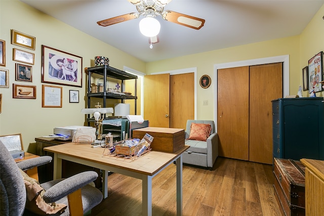 home office with ceiling fan and wood-type flooring