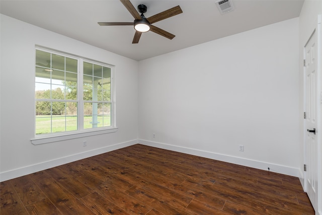 unfurnished room featuring dark hardwood / wood-style floors and ceiling fan