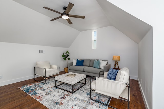 living room featuring dark wood-type flooring, ceiling fan, and lofted ceiling