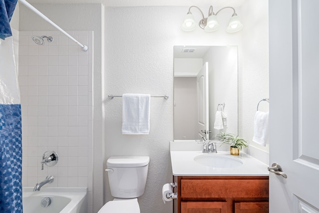 full bathroom featuring toilet, shower / tub combo with curtain, and vanity