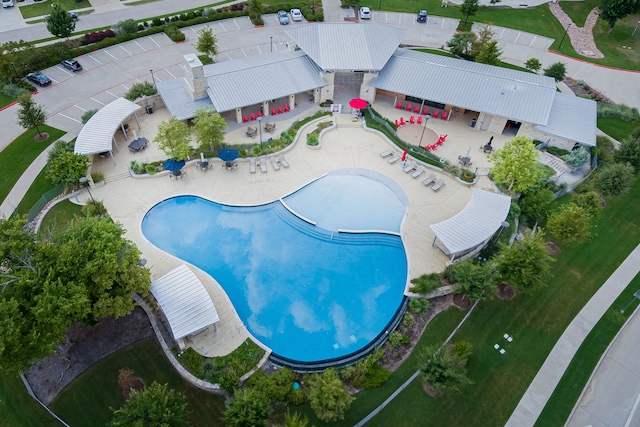 view of swimming pool featuring a patio area