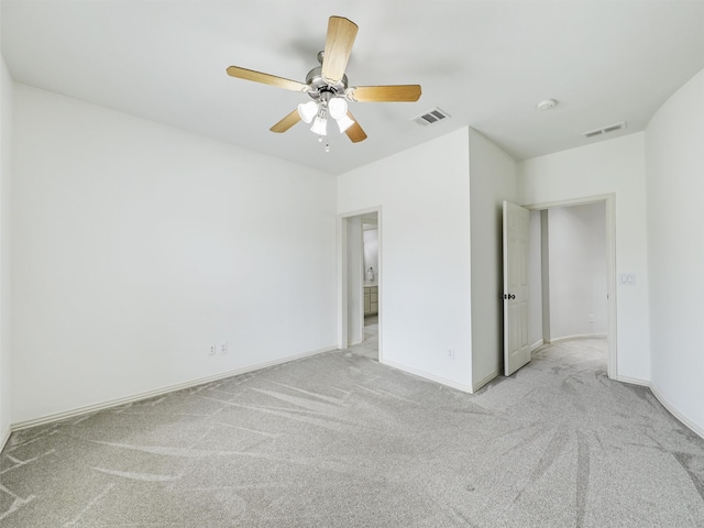 unfurnished bedroom with light carpet and ceiling fan