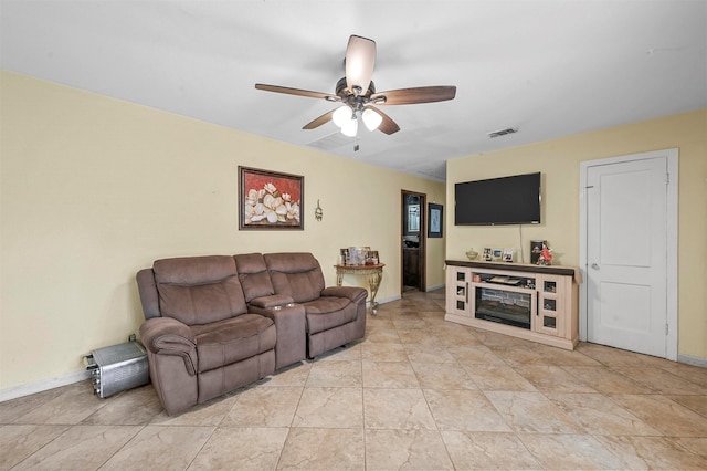 living room featuring ceiling fan