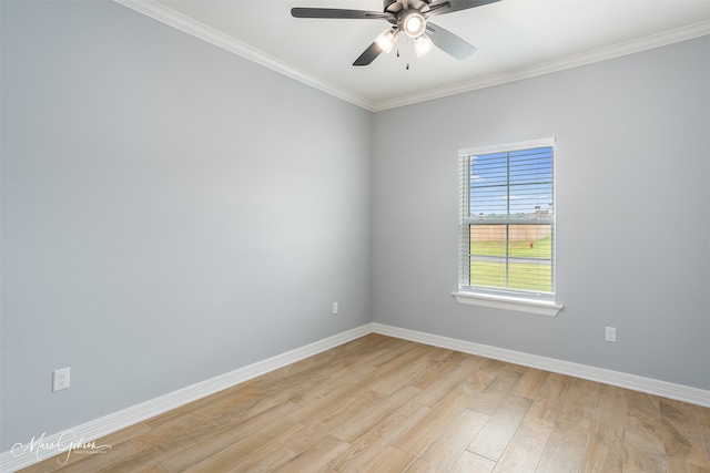 empty room with crown molding, light hardwood / wood-style flooring, and ceiling fan