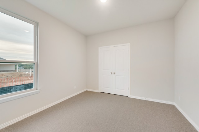 spare room with carpet floors