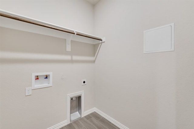 laundry room featuring washer hookup, electric dryer hookup, wood-type flooring, and hookup for a gas dryer