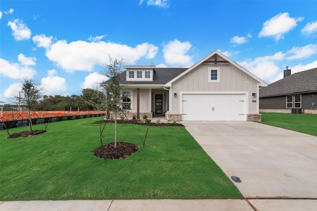 craftsman-style home with a garage and a front yard