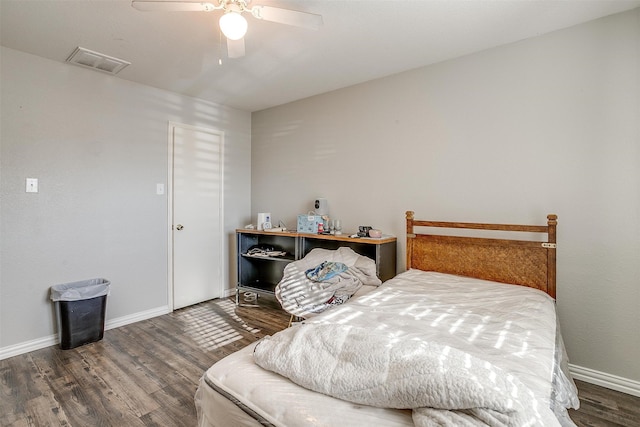 bedroom featuring wood-type flooring and ceiling fan