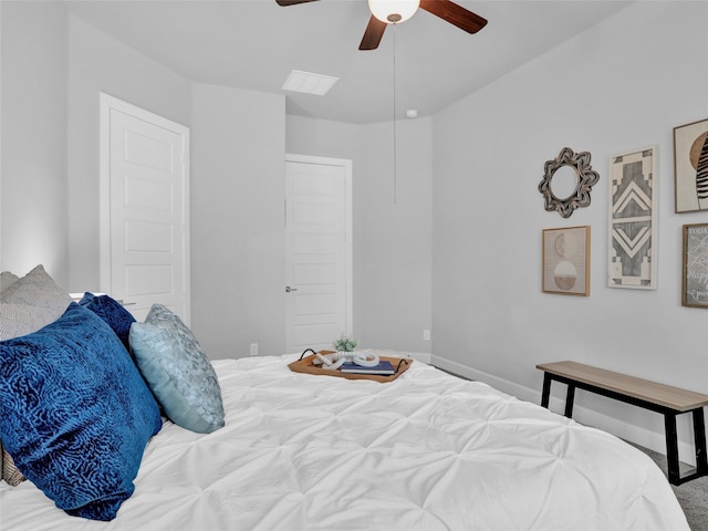 carpeted bedroom featuring ceiling fan