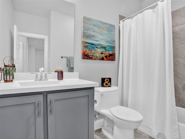 full bathroom featuring tile patterned floors, shower / bathtub combination with curtain, vanity, and toilet