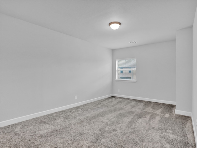 empty room featuring carpet floors