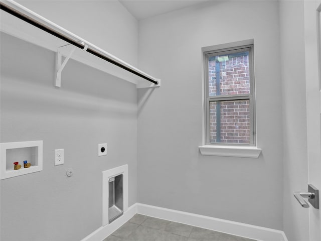 laundry room featuring hookup for an electric dryer, gas dryer hookup, light tile patterned floors, and washer hookup