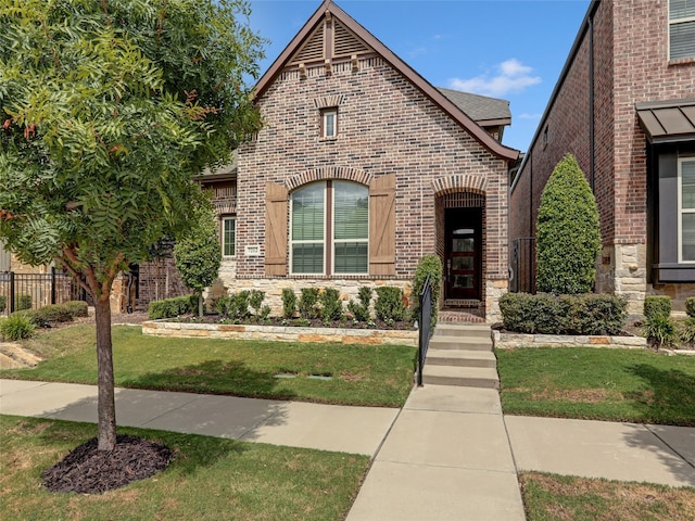 view of front of home with a front yard