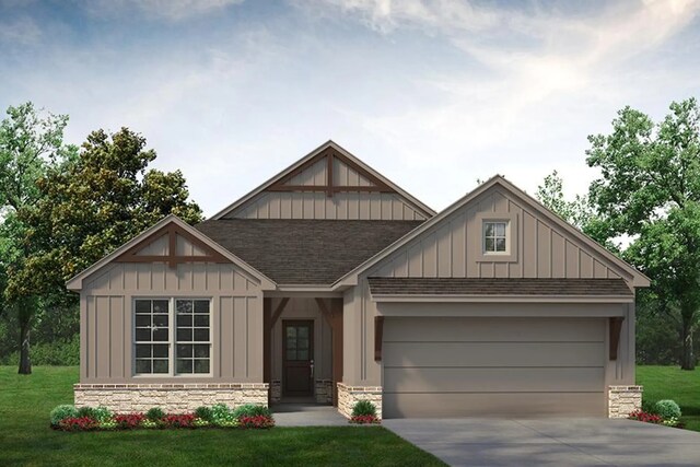 craftsman inspired home featuring a front lawn and a garage