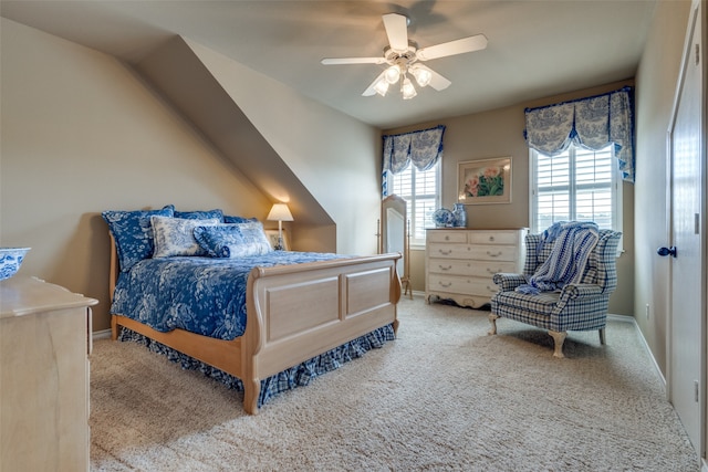 bedroom featuring ceiling fan and light carpet