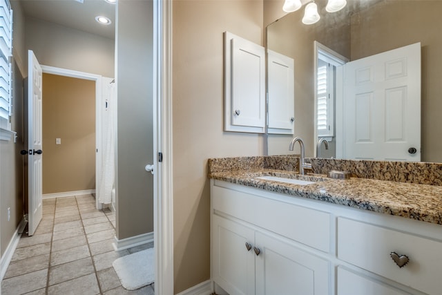 bathroom featuring vanity and tile patterned flooring