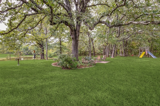 view of yard featuring a playground