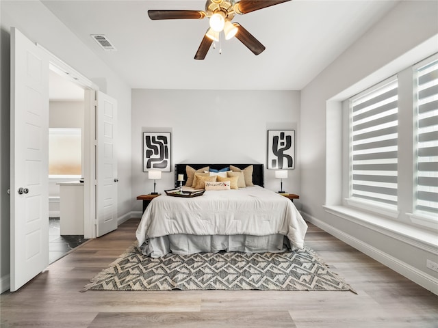 bedroom featuring ceiling fan and hardwood / wood-style floors