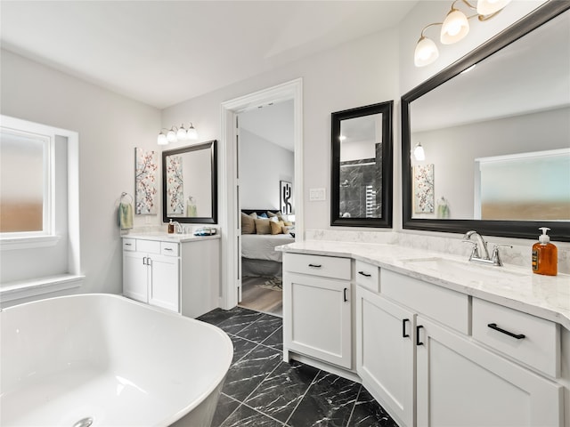 bathroom with a bathing tub and vanity