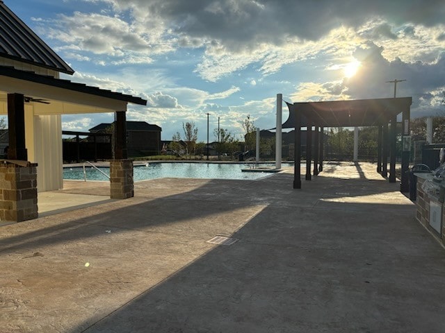 view of pool featuring a patio